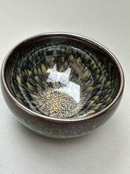 Bird feather cup